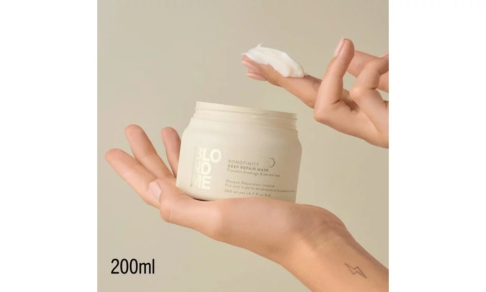 https://cdn.shopify.com/s/files/1/0915/0932/6199/files/schwarzkopf-professional-schwarzkopf-deep-repair-mask.477336301.webp?v=1755911999